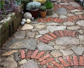 mosaic of recycled paving materials